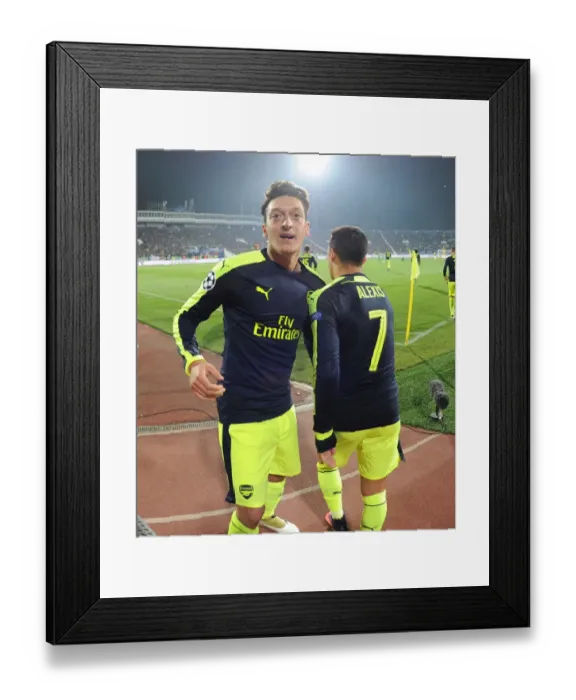 Framed Print : Arsenal's Ozil and Sanchez: Unstoppable Duo Celebrates Goals in Arsenal's Victory over Ludogorets (2016-17 UEFA Champions League) Framed Print : Arsenal's Ozil and Sanchez: Unstoppable Duo Celebrates Goals in Arsenal's Victory over Ludogorets (2016-17 UEFA Champions League)