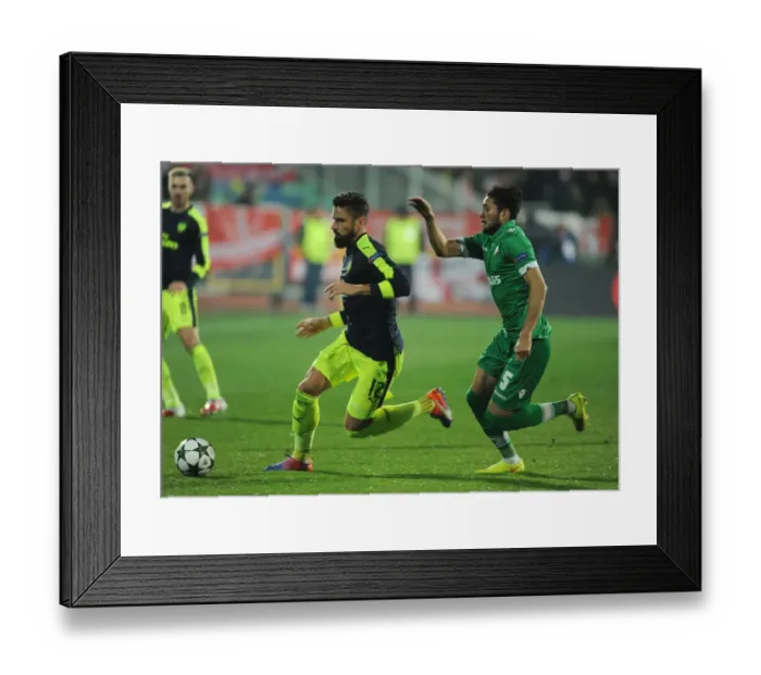 Framed Print : Arsenal's Olivier Giroud Scores Past Ludogorets Jose Luis Palomino in 2016-17 Champions League Clash