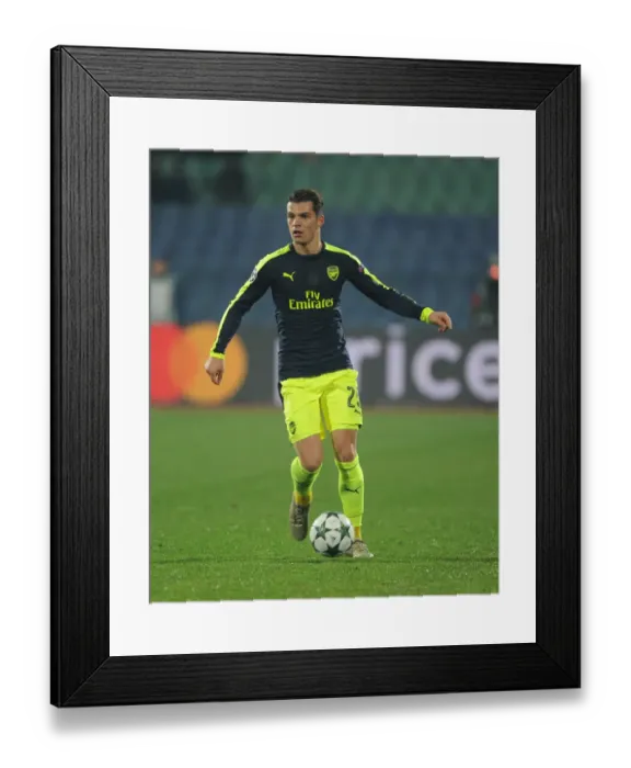 Framed Print : Granit Xhaka: Arsenal's Midfield Mastermind Dazzles in UEFA Champions League Battle against Ludogorets