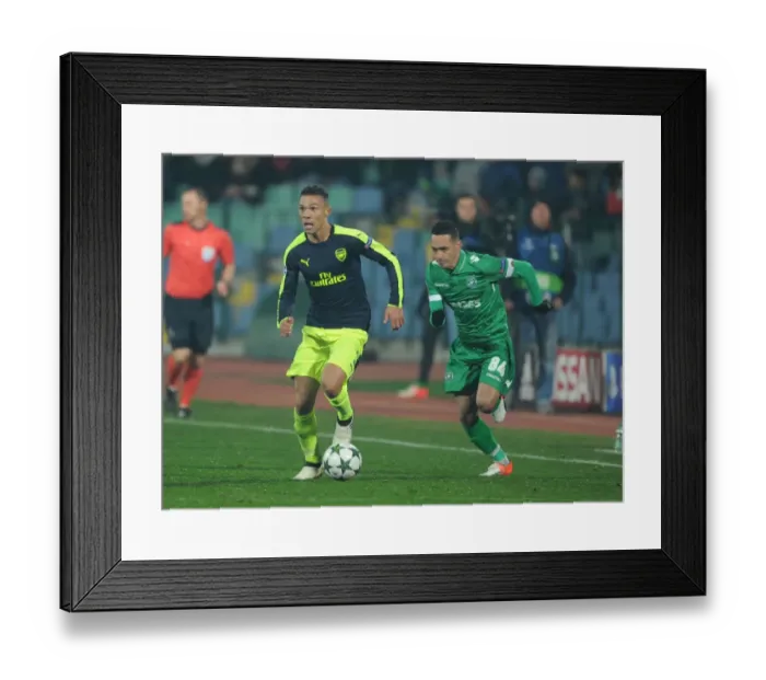 Framed Print : Arsenal's Kieran Gibbs Outmaneuvers Marcelinho in PFC Ludogorets Razgrad vs Arsenal FC UEFA Champions League Clash Framed Print : Arsenal's Kieran Gibbs Outmaneuvers Marcelinho in PFC Ludogorets Razgrad vs Arsenal FC UEFA Champions League Clash