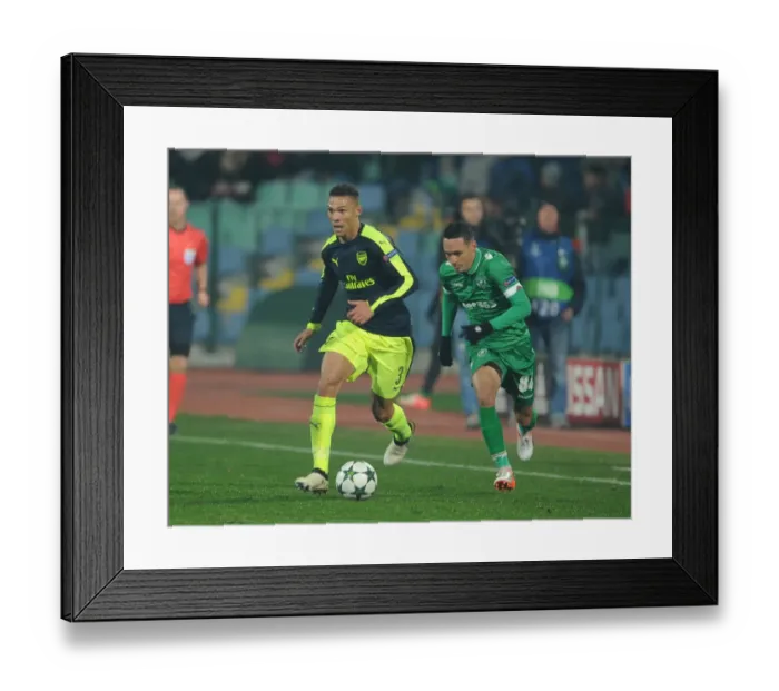 Framed Print : Arsenal's Kieran Gibbs Overpowers Marcelinho in PFC Ludogorets Razgrad vs Arsenal FC UEFA Champions League Clash Framed Print : Arsenal's Kieran Gibbs Overpowers Marcelinho in PFC Ludogorets Razgrad vs Arsenal FC UEFA Champions League Clash