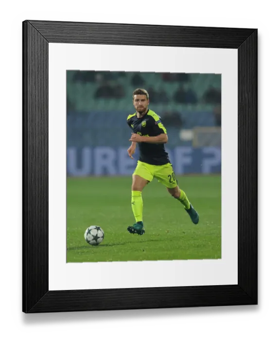 Framed Print : Shkodran Mustafi: Arsenal's Defensive Force in UEFA Champions League Match vs Ludogorets, 2016