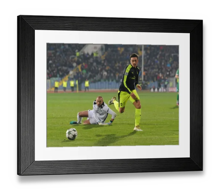 Framed Print : Mesut Ozil Outmaneuvers Milan Borjan in Arsenal's UEFA Champions League Clash against Ludogorets Framed Print : Mesut Ozil Outmaneuvers Milan Borjan in Arsenal's UEFA Champions League Clash against Ludogorets