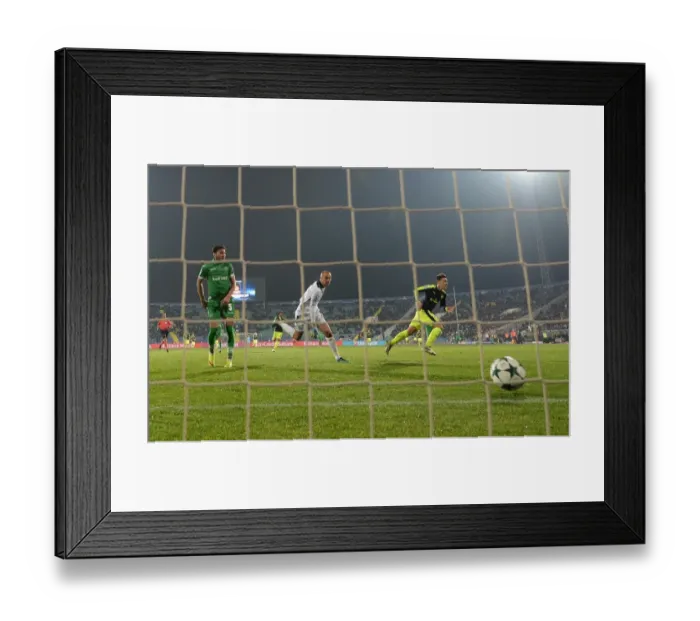 Framed Print : Mesut Ozil Scores the Third Goal: Arsenal's Triumph over Ludogorets in the UEFA Champions League, Sofia, Bulgaria (November 2016) Framed Print : Mesut Ozil Scores the Third Goal: Arsenal's Triumph over Ludogorets in the UEFA Champions League, Sofia, Bulgaria (November 2016)