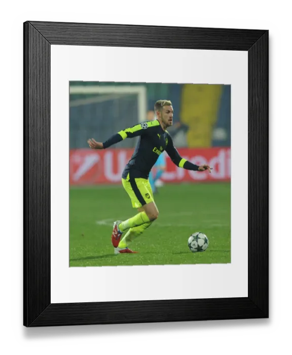 Framed Print : Aaron Ramsey in Action: Arsenal vs Ludogorets, UEFA Champions League 2016-17