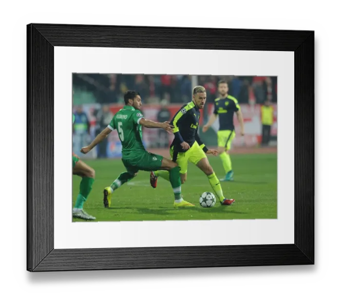 Framed Print : Aaron Ramsey vs. Jose Luis Palomino: A UEFA Champions League Showdown