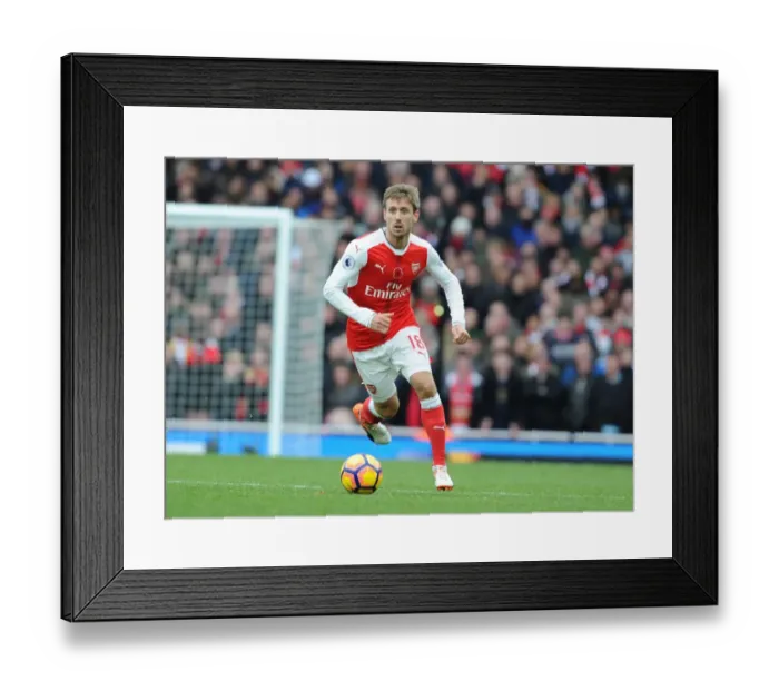 Framed Print : Arsenal vs. Tottenham: Monreal's Intense Battle at Emirates Stadium (2016-17) Framed Print : Arsenal vs. Tottenham: Monreal's Intense Battle at Emirates Stadium (2016-17)