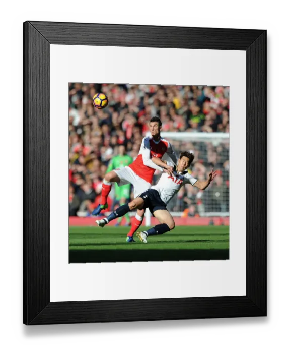 Framed Print : Arsenal vs. Tottenham: Koscielny vs. Son - A Premier League Rivalry Clash (2016-17) Framed Print : Arsenal vs. Tottenham: Koscielny vs. Son - A Premier League Rivalry Clash (2016-17)