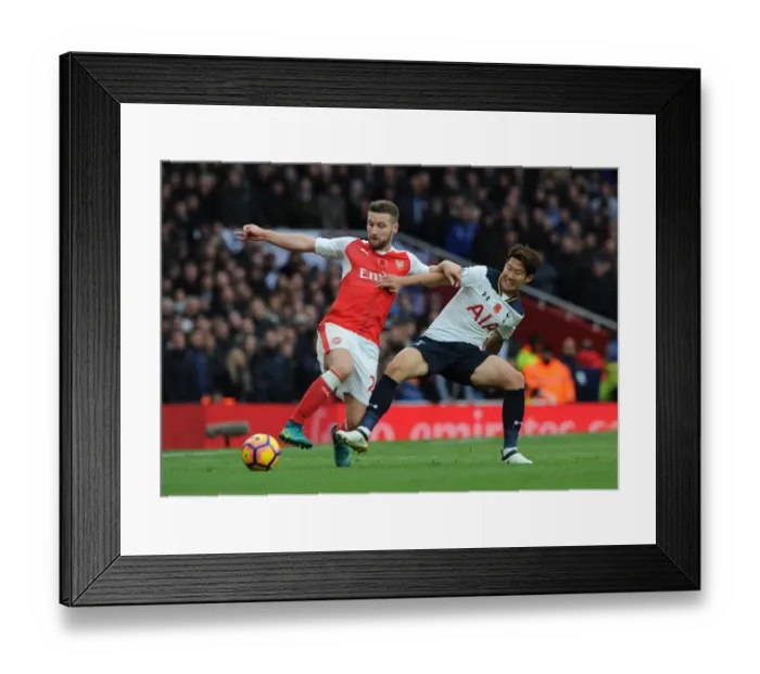 Framed Print : Mustafi vs. Son: Intense Battle in the Arsenal vs. Tottenham Clash at Emirates Stadium (2016-17)