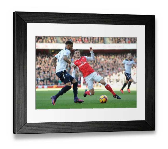 Framed Print : Xhaka vs. Walker: A Premier League Rivalry Clash - Arsenal vs. Tottenham