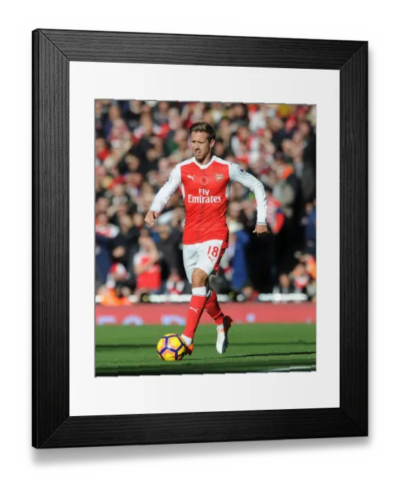 Framed Print : Arsenal vs. Tottenham: Monreal in Action at the Emirates Rivalry (2016-17) Framed Print : Arsenal vs. Tottenham: Monreal in Action at the Emirates Rivalry (2016-17)