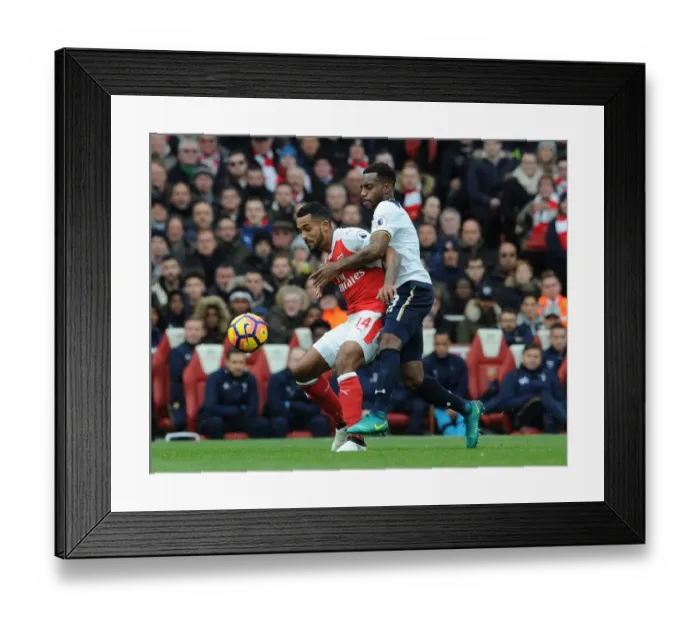 Framed Print : Arsenal vs. Tottenham: Theo Walcott Holds Off Danny Rose in Intense Premier League Clash (2016-17) Framed Print : Arsenal vs. Tottenham: Theo Walcott Holds Off Danny Rose in Intense Premier League Clash (2016-17)