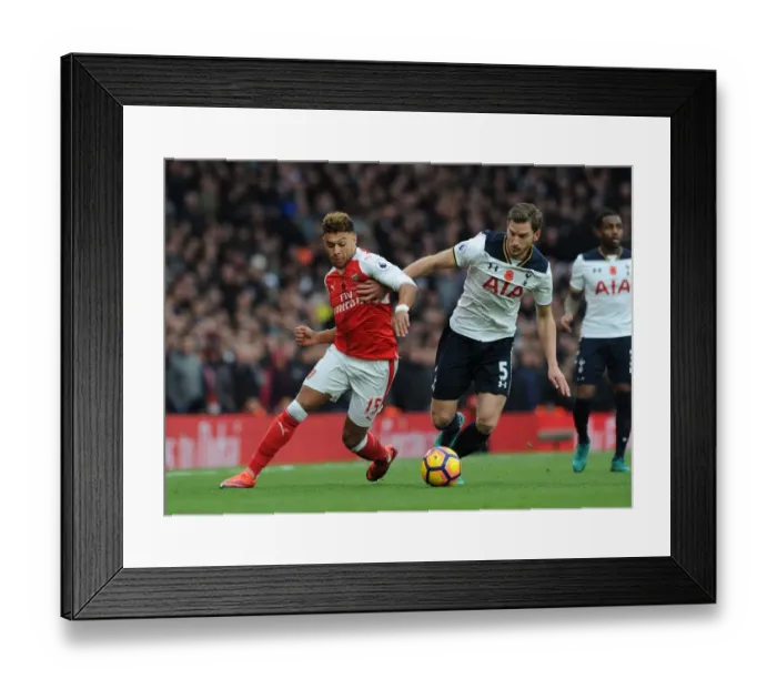Framed Print : Arsenal vs. Tottenham: Oxlade-Chamberlain vs. Vertonghen Clash in the 2016-17 Premier League Framed Print : Arsenal vs. Tottenham: Oxlade-Chamberlain vs. Vertonghen Clash in the 2016-17 Premier League