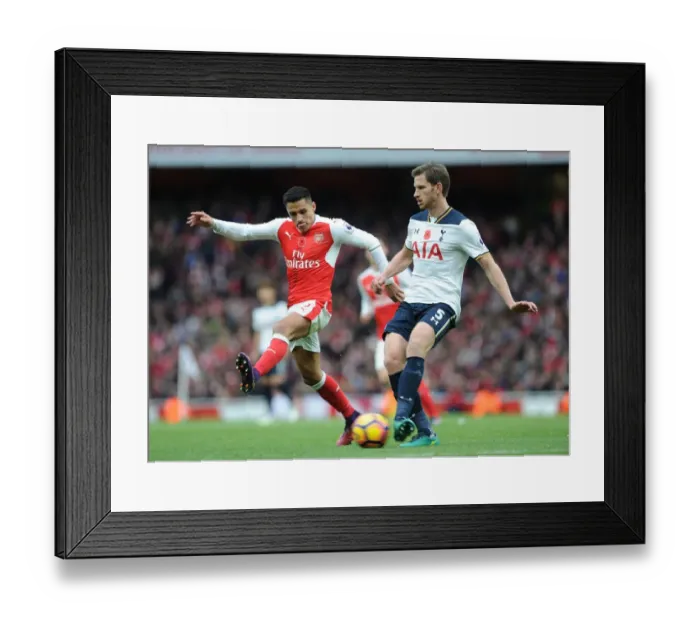 Framed Print : Arsenal vs. Tottenham: Sanchez Closes In on Vertonghen in Intense Premier League Showdown Framed Print : Arsenal vs. Tottenham: Sanchez Closes In on Vertonghen in Intense Premier League Showdown