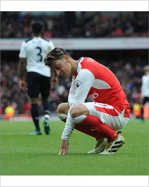 Disappointed Mesut Ozil: Arsenal's Agonizing Defeat to Tottenham Hotspur, Premier League 2016-17