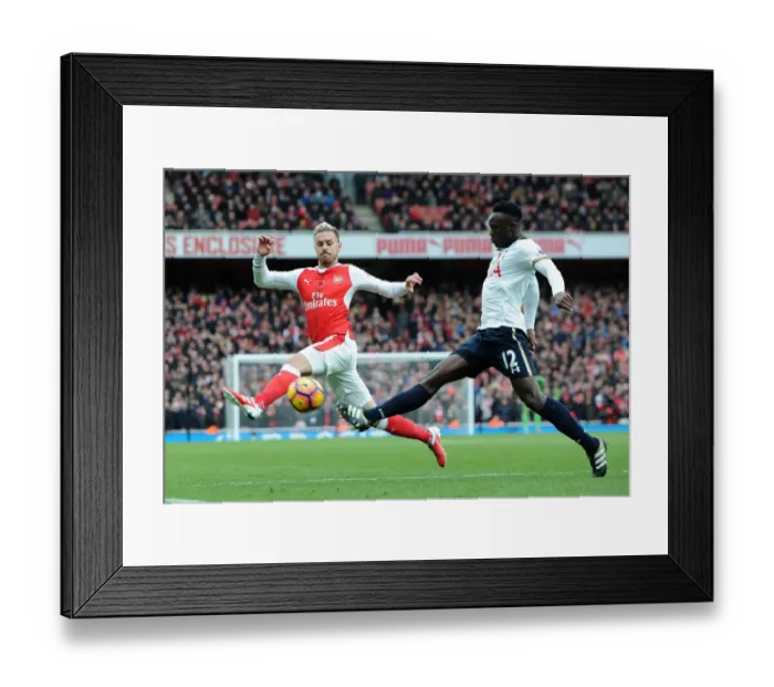 Framed Print : Arsenal vs. Tottenham: Ramsey Closes In on Wanyama in Intense Premier League Clash