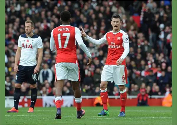 Arsenal vs. Tottenham: Koscielny Coaches Iwobi during Intense Premier League Clash (2016-17)
