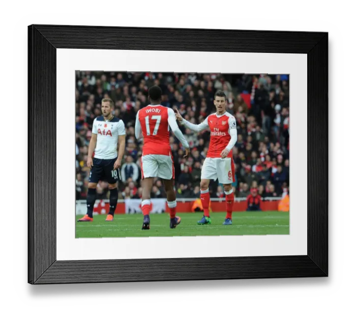 Framed Print : Arsenal vs. Tottenham: Koscielny Coaches Iwobi during Intense Premier League Clash (2016-17)