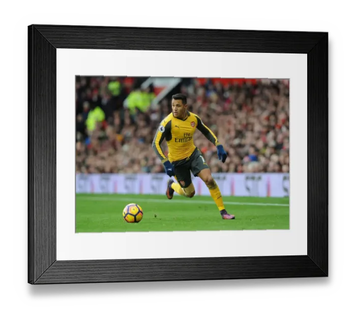 Framed Print : Clash of the Titans: Manchester United vs Arsenal - Premier League 2016-17: Alexis Sanchez Faces Off at Old Trafford Framed Print : Clash of the Titans: Manchester United vs Arsenal - Premier League 2016-17: Alexis Sanchez Faces Off at Old Trafford