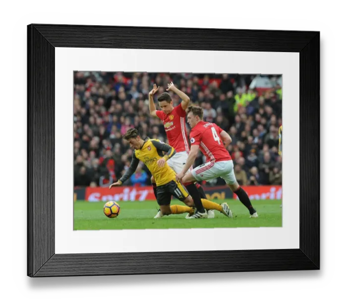 Framed Print : Mesut Ozil Clashes with Manchester United's Ander Herrera and Phil Jones during the Intense 2016-17 Premier League Match
