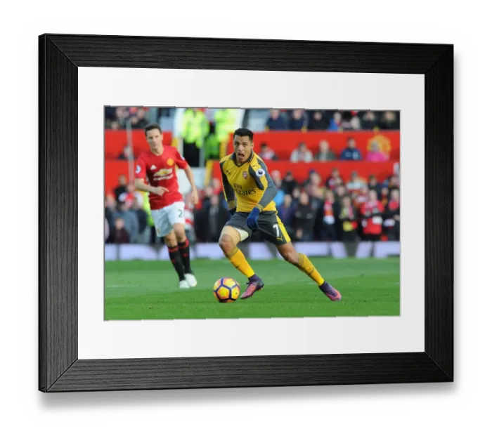 Framed Print : Clash of the Titans: Manchester United vs Arsenal - A Battle of Giants: Alexis Sanchez's Determined Stand at Old Trafford (Premier League 2016-17)