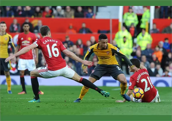 Clash of Titans: Coquelin Stands Firm Against Manchester United's Midfield Duo