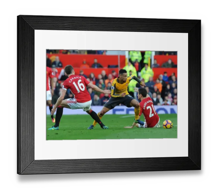 Framed Print : Clash at Old Trafford: Coquelin Stands Firm Against United's Midfield Trio Framed Print : Clash at Old Trafford: Coquelin Stands Firm Against United's Midfield Trio