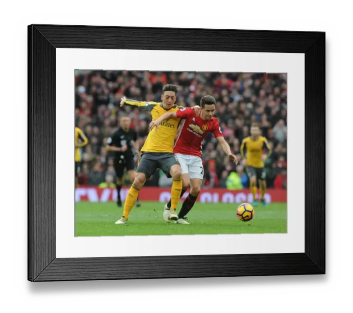 Framed Print : Mesut Ozil vs Ander Herrera: Battle at Old Trafford - Manchester United vs Arsenal, Premier League 2016-17 Framed Print : Mesut Ozil vs Ander Herrera: Battle at Old Trafford - Manchester United vs Arsenal, Premier League 2016-17