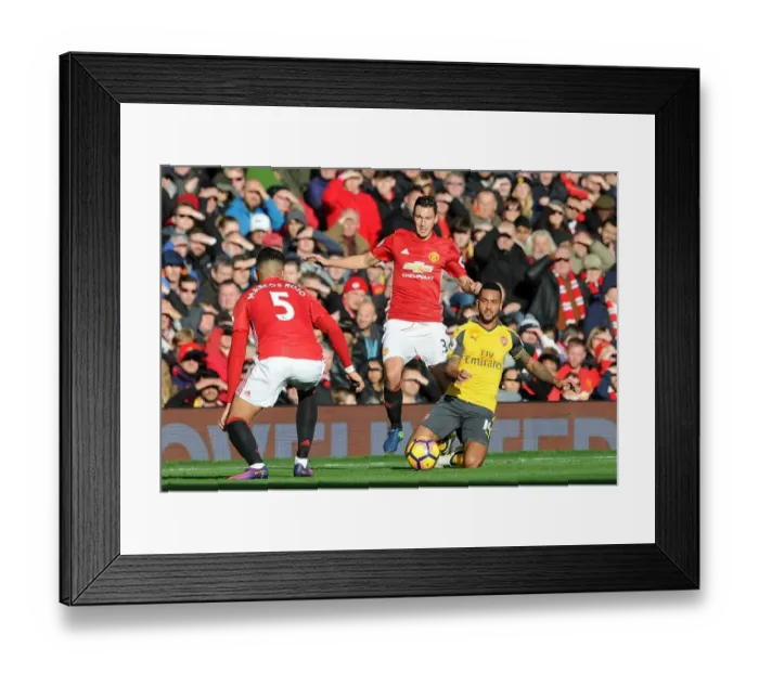 Framed Print : Manchester United vs. Arsenal: Theo Walcott Tripped by Matteo Darmian (Premier League 2016-17) Framed Print : Manchester United vs. Arsenal: Theo Walcott Tripped by Matteo Darmian (Premier League 2016-17)