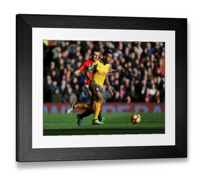 Framed Print : Theo Walcott vs. Matteo Darmian: A Premier League Showdown at Old Trafford (2016-17) Framed Print : Theo Walcott vs. Matteo Darmian: A Premier League Showdown at Old Trafford (2016-17)