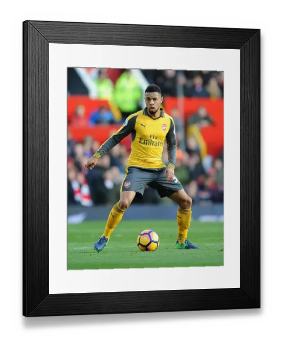 Framed Print : Arsenal's Coquelin Faces Off Against Manchester United at Old Trafford (2016-17 Premier League) Framed Print : Arsenal's Coquelin Faces Off Against Manchester United at Old Trafford (2016-17 Premier League)