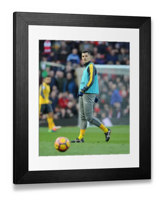 Framed Print : Granit Xhaka: Arsenal Star's Pre-Match Focus at Old Trafford (Manchester United vs Arsenal, 2016-17)