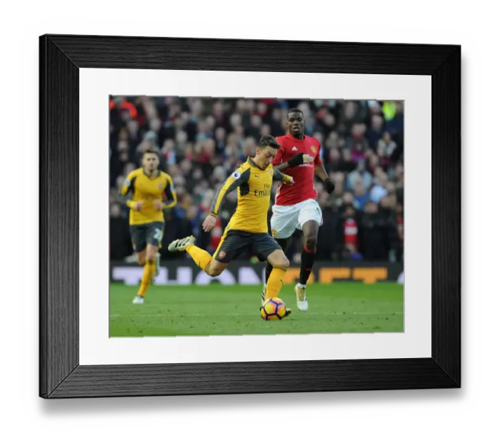 Framed Print : Mesut Ozil Breaks Past Pogba: Manchester United vs. Arsenal, Premier League 2016-17