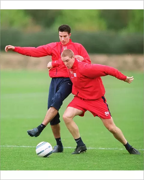 Philippe Senderos and Robin van Persie (Arsenal). Arsenal Training Session