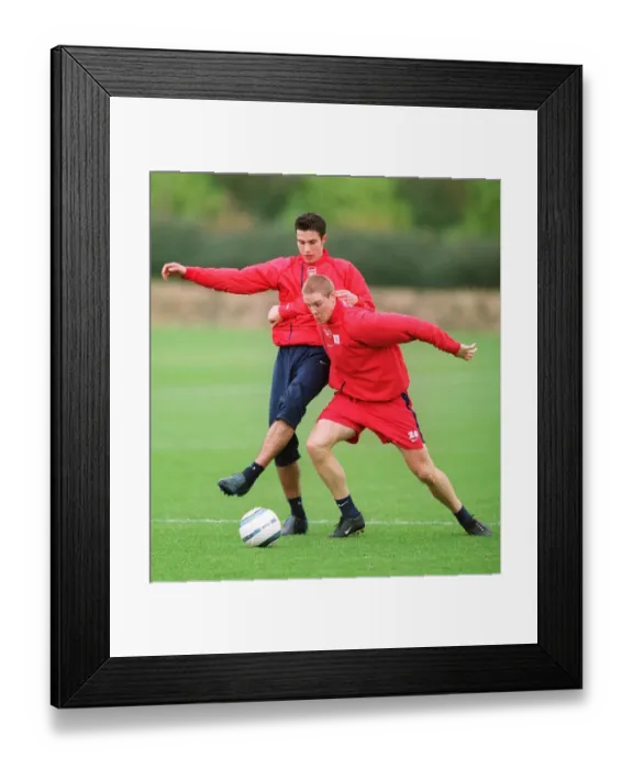 Framed Print : Philippe Senderos and Robin van Persie (Arsenal). Arsenal Training Session Framed Print : Philippe Senderos and Robin van Persie (Arsenal). Arsenal Training Session