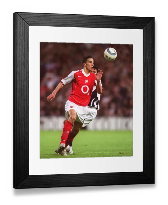 Framed Print : Robin van Persie: Arsenal's Unforgettable Striker - A Legendary Player