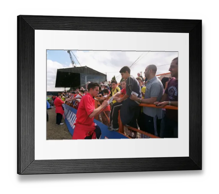 Framed Print : Robin van Persie (Arsenal) signs autographs. Barnet v Arsenal Framed Print : Robin van Persie (Arsenal) signs autographs. Barnet v Arsenal