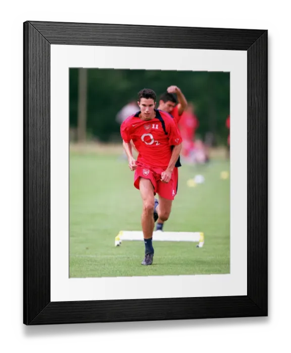 Framed Print : Arsenal Football Club: Training with Robin van Persie, Austria 2004 Framed Print : Arsenal Football Club: Training with Robin van Persie, Austria 2004