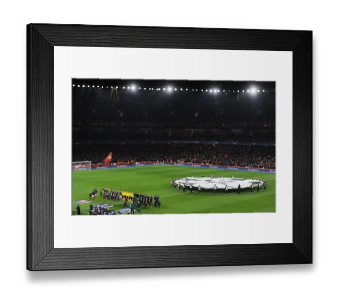 Framed Print : Champions League Clash: Arsenal vs Paris Saint-Germain at Emirates Stadium