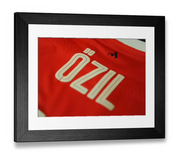 Framed Print : Mesut Ozil's Pre-Match Focus: Arsenal Changing Room Moment before Arsenal vs Paris Saint-Germain, UEFA Champions League 2016-17 Framed Print : Mesut Ozil's Pre-Match Focus: Arsenal Changing Room Moment before Arsenal vs Paris Saint-Germain, UEFA Champions League 2016-17