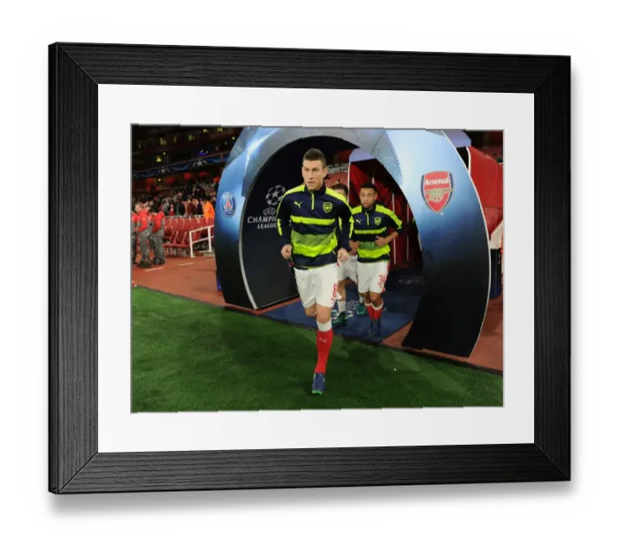 Framed Print : Arsenal's Laurent Koscielny Before Arsenal v Paris Saint-Germain UCL Clash (2016-17)