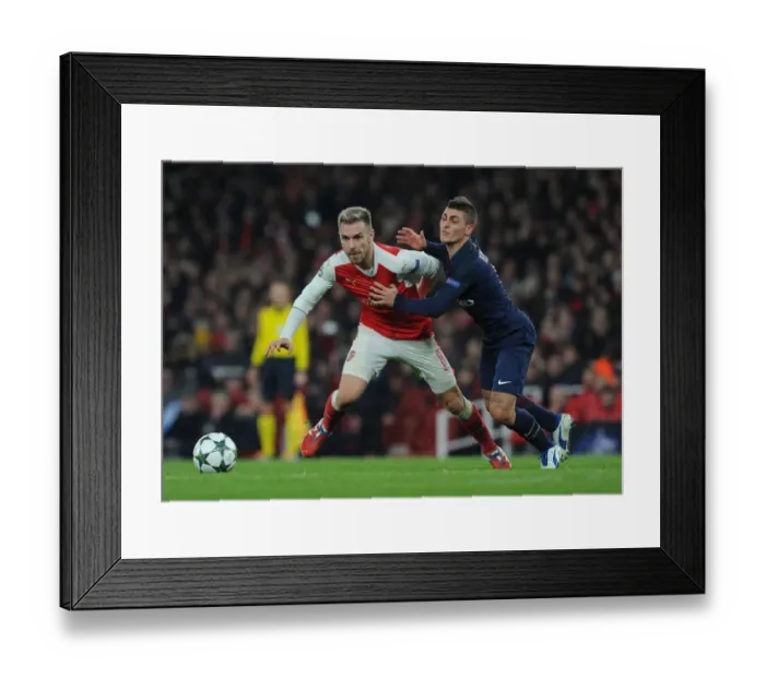 Framed Print : Arsenal vs. Paris Saint-Germain: Aaron Ramsey vs. Marco Verratti Battle in the 2016-17 UEFA Champions League Framed Print : Arsenal vs. Paris Saint-Germain: Aaron Ramsey vs. Marco Verratti Battle in the 2016-17 UEFA Champions League
