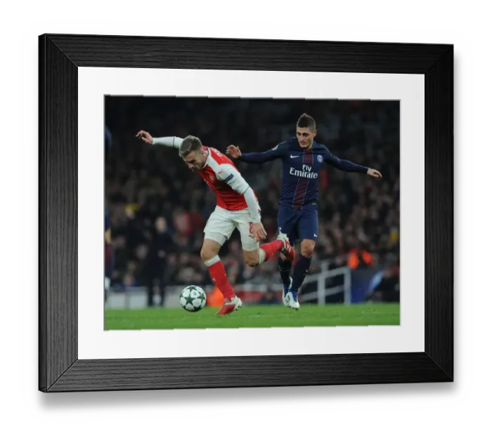 Framed Print : Clash of Midfield Maestros: Ramsey vs. Verratti, Arsenal vs. Paris Saint-Germain, Champions League 2016-17