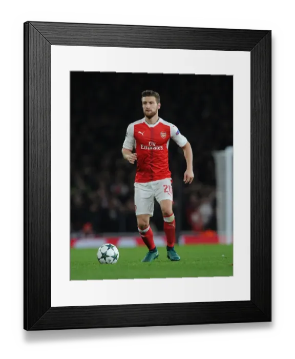 Framed Print : Mustafi's Unforgettable Night: Arsenal Stuns PSG at Emirates (UEFA Champions League 2016-17)