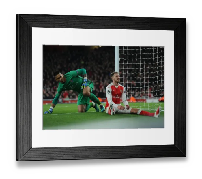 Framed Print : Arsenal's Aaron Ramsey Fumes as Paris Saint-Germain Holds the Upper Hand Framed Print : Arsenal's Aaron Ramsey Fumes as Paris Saint-Germain Holds the Upper Hand