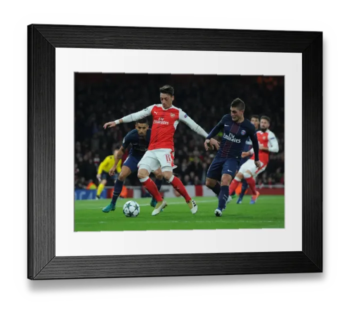 Framed Print : Strategic Showdown: Ozil vs. Verratti - Arsenal vs. Paris Saint-Germain, Champions League Clash Framed Print : Strategic Showdown: Ozil vs. Verratti - Arsenal vs. Paris Saint-Germain, Champions League Clash