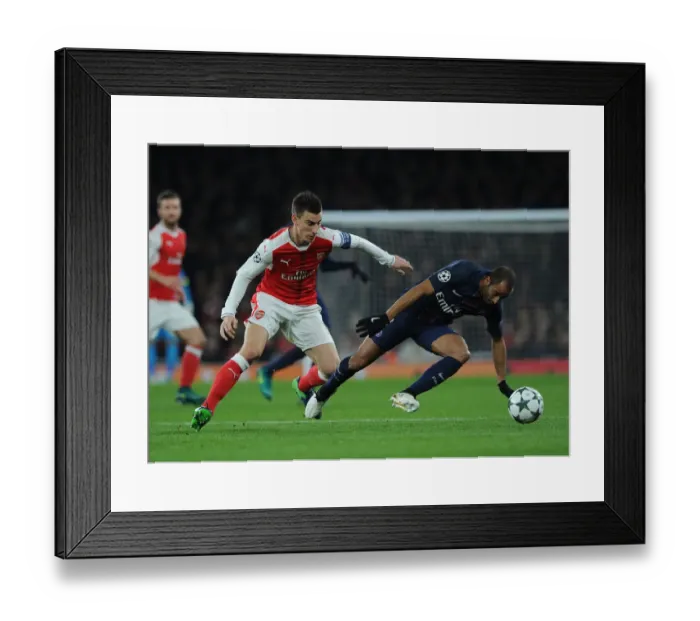 Framed Print : Battle of the Stars: Koscielny vs. Moura in Arsenal vs. Paris Saint-Germain UCL Clash Framed Print : Battle of the Stars: Koscielny vs. Moura in Arsenal vs. Paris Saint-Germain UCL Clash