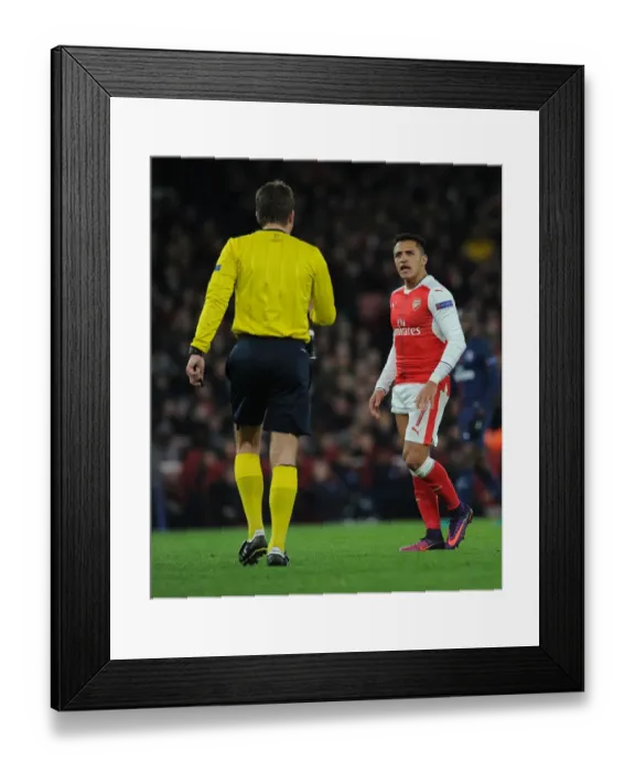 Framed Print : Arsenal's Alexis Sanchez Argues with Referee during Arsenal v Paris Saint-Germain UCL Clash