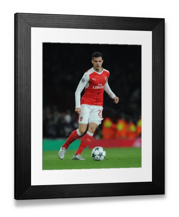 Framed Print : Granit Xhaka in Action: Arsenal FC vs Paris Saint-Germain, UEFA Champions League 2016-17 Framed Print : Granit Xhaka in Action: Arsenal FC vs Paris Saint-Germain, UEFA Champions League 2016-17