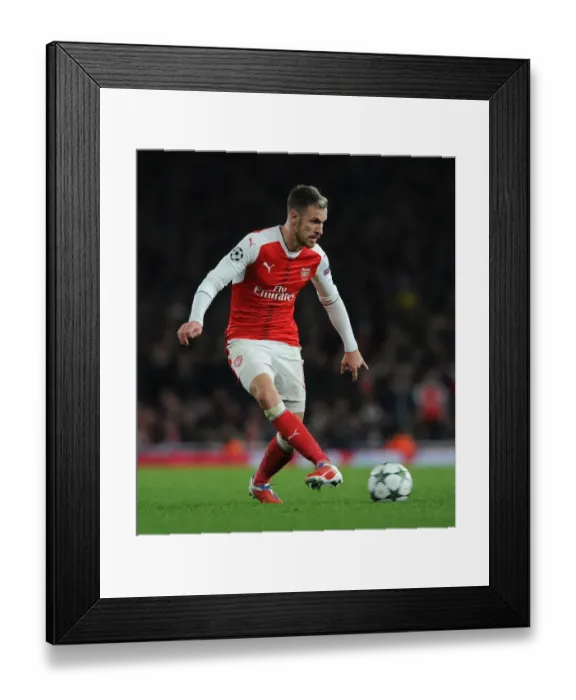 Framed Print : Ramsey's Midfield Battle: Arsenal vs. Paris Saint-Germain in Champions League Showdown Framed Print : Ramsey's Midfield Battle: Arsenal vs. Paris Saint-Germain in Champions League Showdown